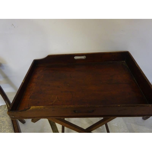 129 - Antique mahogany butlers tray on stand and a pair of Victorian side chairs.