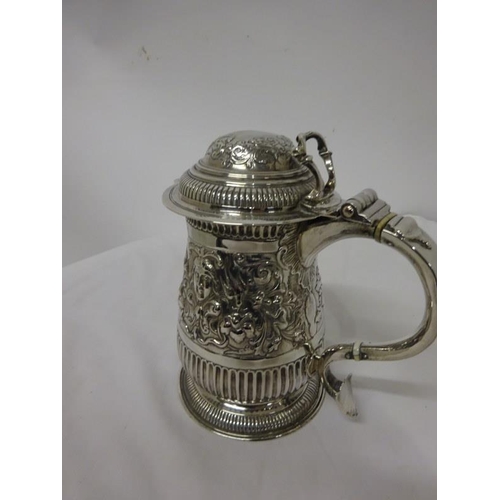 149 - An English silver lidded jug, the base inscribed from Jane Countess of Bantry 1877 (Jane Countess of... 