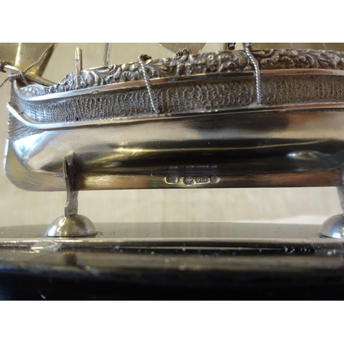 177 - Maltese silver sailing boat and oar mounted on timber plaque.