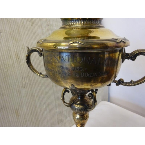 178 - An ornate silver and gilt Trophy Cup. International Cup February 1935 won by P.O'Brien's Bd. D. Ocea... 