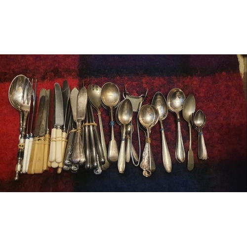 181 - A quantity of plated cutlery.