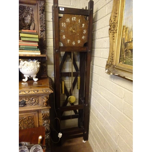 188 - An Arts and Crafts oak case long cased clock, (Minute hand and one number, 9 missing). H. 200cm appr... 