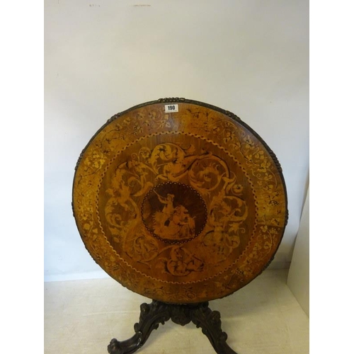 190 - A good 19th century Irish circular table, the walnut top extensively inlaid having carved freize and... 