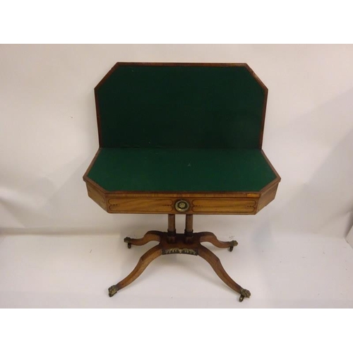 193 - Georgian mahogany and brass mounted fold over card table raised on twin column supports and reeded s... 