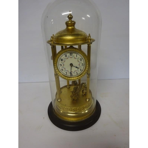 20 - Old brass mantle clock under glass dome, not working.