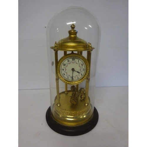 20 - Old brass mantle clock under glass dome, not working.