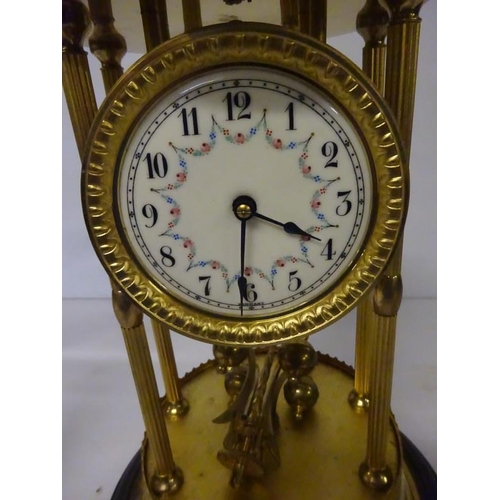 20 - Old brass mantle clock under glass dome, not working.