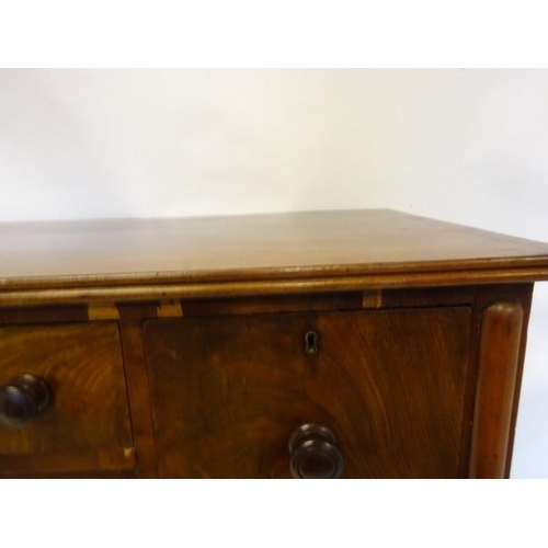 241 - A 19th century mahogany sideboard fitted with drawers and raised on turned legs. (some restoration r... 