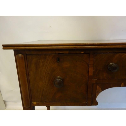 241 - A 19th century mahogany sideboard fitted with drawers and raised on turned legs. (some restoration r... 