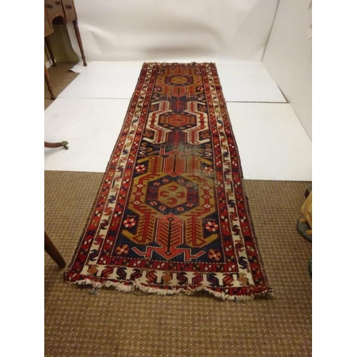 275 - Old Persian runner rug, (some parts worn). 322cm x 96cm approx.