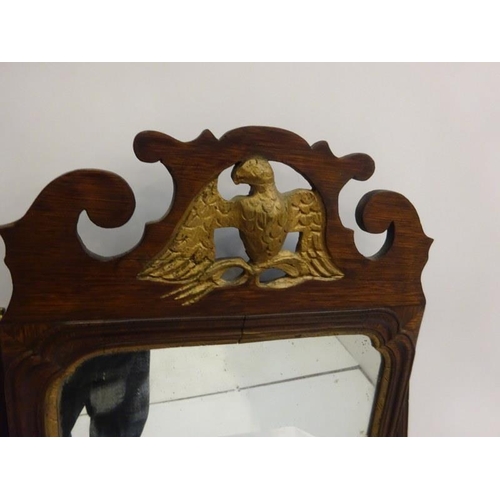 277 - Timber framed dressing mirror with eagle framed decoration.