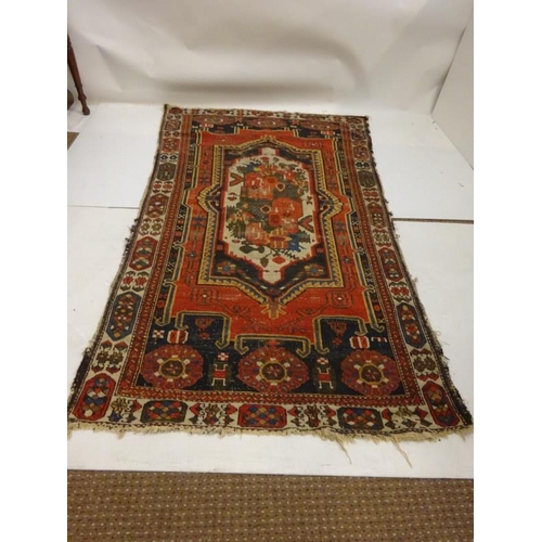 280 - Old Persian rug (centre part worn). 232cm x 127cm approx.