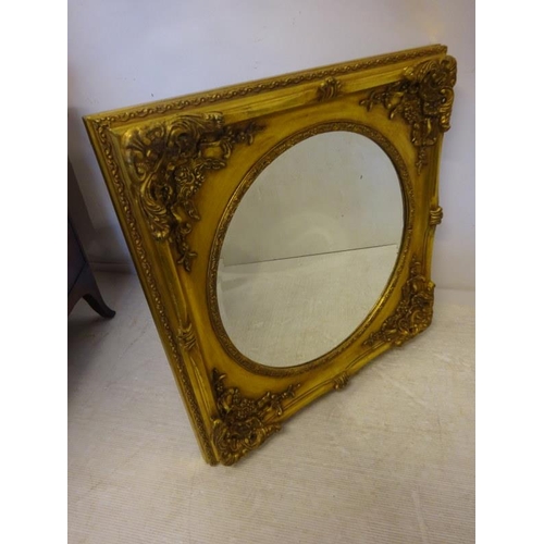 281 - Decorative gilt framed mirror. 85cm x 85cm.