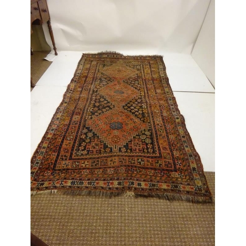 317 - Old Persian drawing room rug. 255cm x 140cm approx.