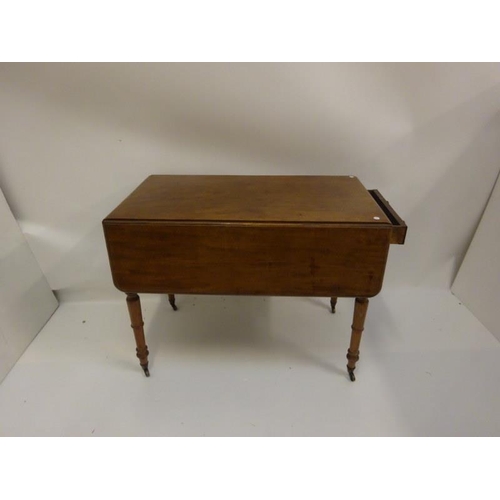 325 - Antique mahogany drop leaf Pembroke table fitted with a drawer and raised on turned legs.