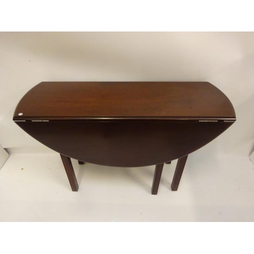 326 - Neat sized mahogany drop leaf table raised on square legs. Length 120cm approx.