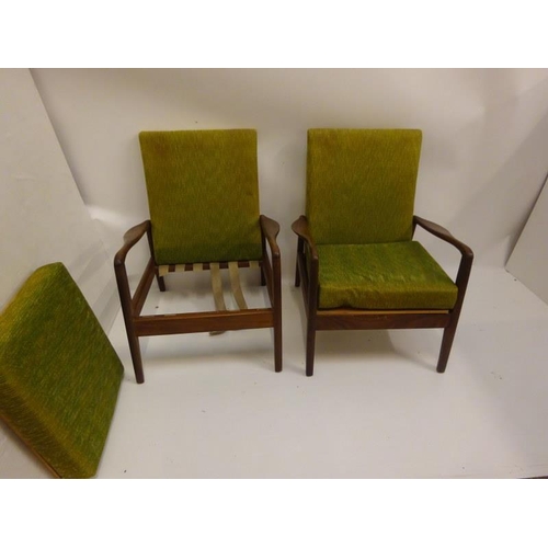 327 - A pair of teak framed easy chairs, (need re-straping).