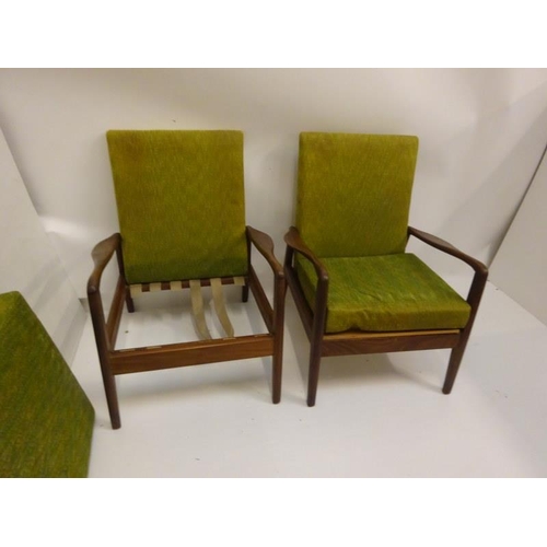 327 - A pair of teak framed easy chairs, (need re-straping).