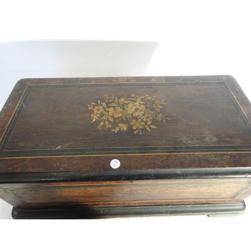 52 - A large Victorian inlaid rosewood cased Swiss music box. (12 tunes) not working. One tooth missing. ... 