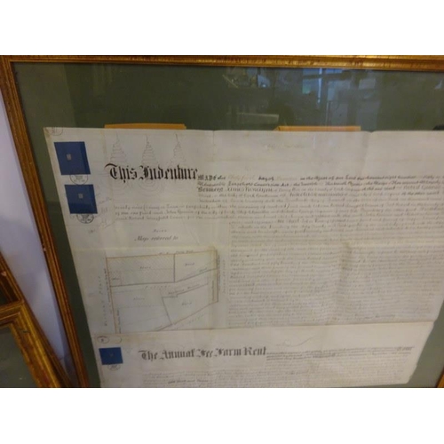 56 - A collection of three old framed indentures and an old will - Cork interest. (4)