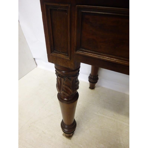 68 - Antique mahogany side or hall table fitted with two drawers and raised on turned legs with carved de... 