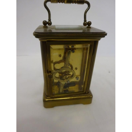 74 - Brass carriage clock, Matthew Norman, London.