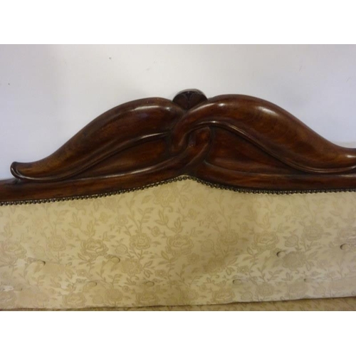 85 - A good antique mahogany framed drawing room or hall couch raised on turned legs. W. 220cm approx.