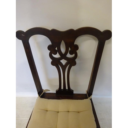 94 - A pair of antique oak Chippendale design side chairs.