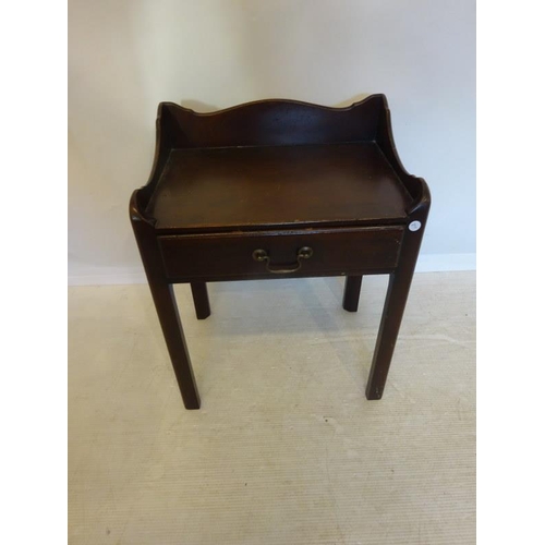 96 - Neat sized mahogany lamp table having gallery back fitted with a drawer and raised on chamfered legs... 