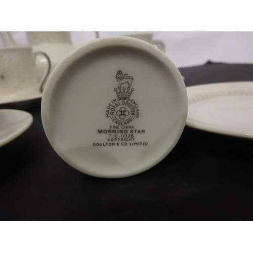 10 - A Royal Doulton China coffee set.