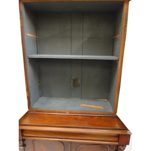 106 - Victorian mahogany 2 door bookcase fitted with a drawer.  W. 108cm, D. 55cm, H. 208cm approx.