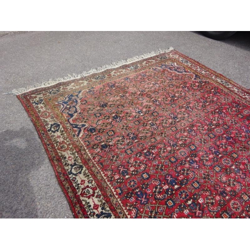 112 - Large old Eastern rug, some fading at one end. 520cm x 205cm.