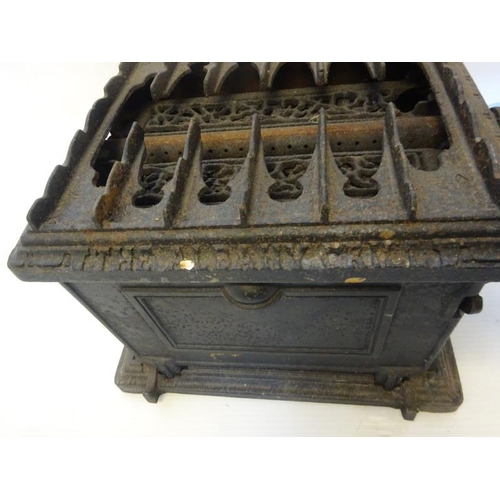 113 - Sougland - An Art Nouveau cast metal stove and together with the Albany grill. (2) Stove measurement... 