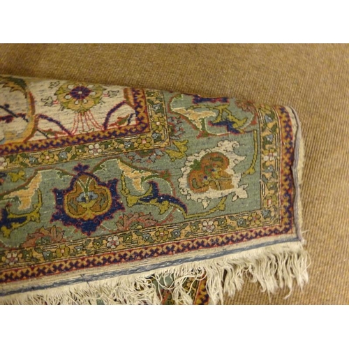 119 - A good Hereke Turkish rug having ivory field and all over design with Hereke inscription to one end.... 