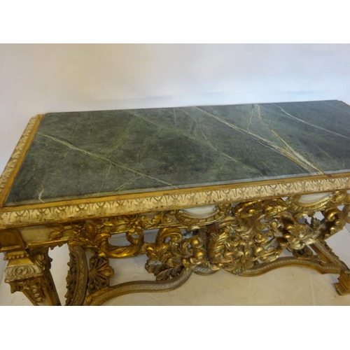 120 - A decorative carved wood painted side table, the rectangular shaped top with green marble inset rais... 