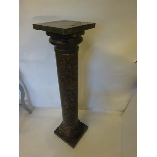 122 - A tall marble pedestal having square top and base and turned column. H. 122cm. Diameter of top 30cm ... 