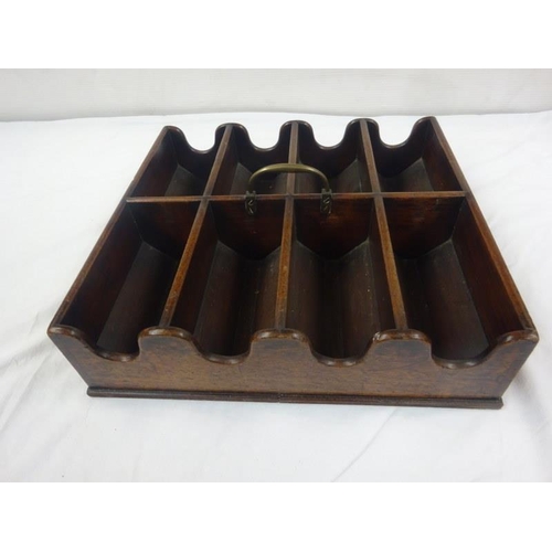 131 - A good Georgian mahogany wine bottle holder with brass carrying handle.