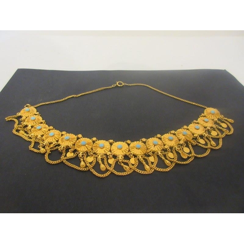 164 - A 21 carat gold and enamel necklace. (Sultan of Oman) 55 grams.