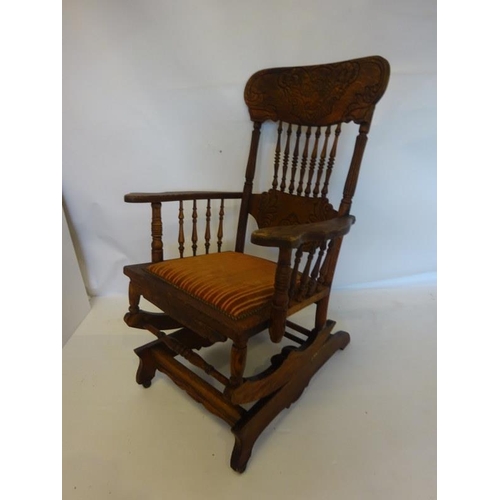 20 - Oak spindle back rocking chair.