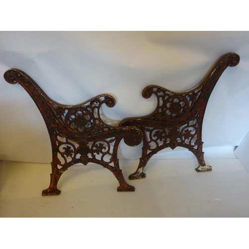 205 - Two decorative metal garden seat ends.