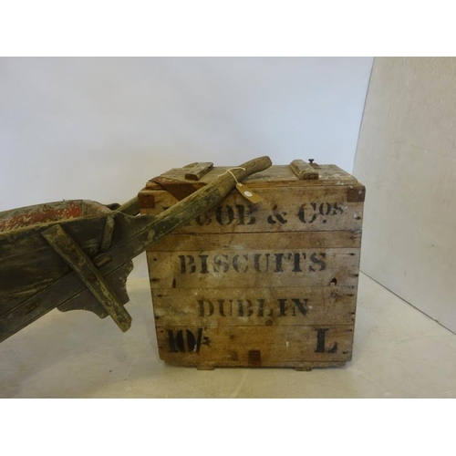 207 - Old Jacobs biscuit box and timber wheelbarrow with metal banded wheel. (2)