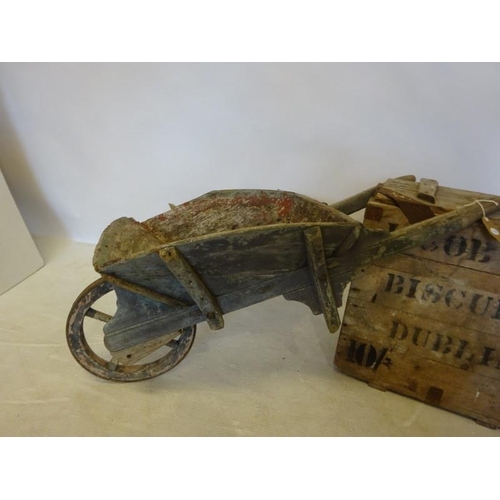 207 - Old Jacobs biscuit box and timber wheelbarrow with metal banded wheel. (2)