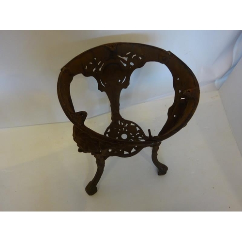 209 - Old cast iron garden table with loose top.