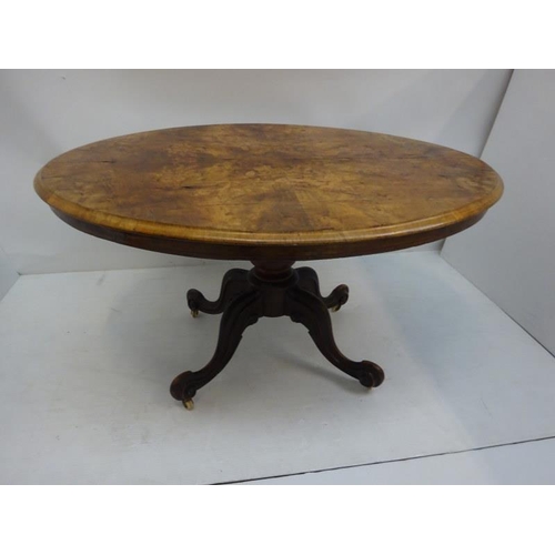 244 - Victorian figured walnut drawing room centre table on four shoot pod support. 134cm x 100cm approx.