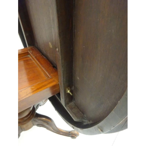 244 - Victorian figured walnut drawing room centre table on four shoot pod support. 134cm x 100cm approx.