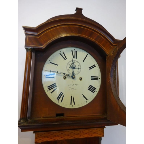 247 - An 19th century inlaid mahogany cased long cased clock having circular white dial by Evans, Cork.