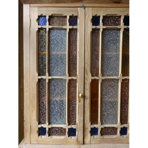 37 - Old pine Kitchen cabinet, the upper part having doors with decorative glass panels, in need of resto... 