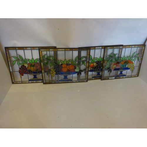 44 - A set of four seasons leaded & stain glass panels. H. 50cm, W. 63cm