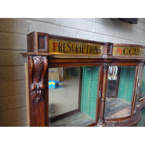 50 - Old Chemist shop cabinet as found. H. 174cm, D. 25cm, W. 240cm approx.  (Shelves missing)