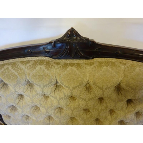 60 - A Victorian walnut framed drawing room settee raised on turned legs. W. 170cm, H. 100cm. Seat depth ... 